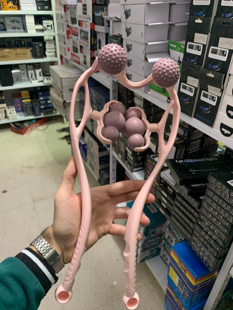 Masseur de corps multifonctionnel à six roues à billes et deux boules