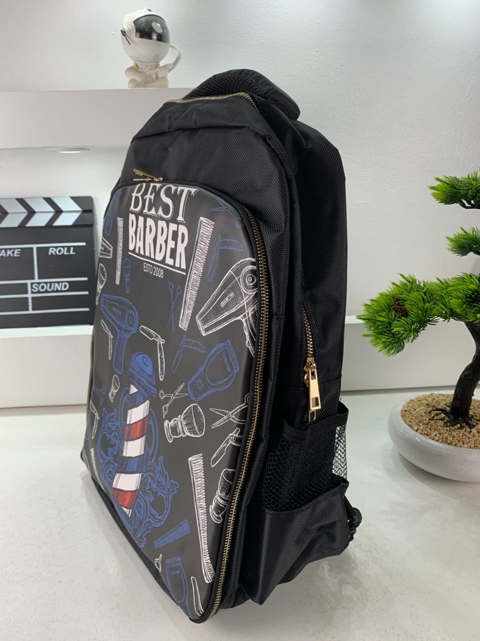 Sac à dos Coiffeur avec des Support pour Tondeuses et Outils Professionnels – حقيبة اغراض الحلاق